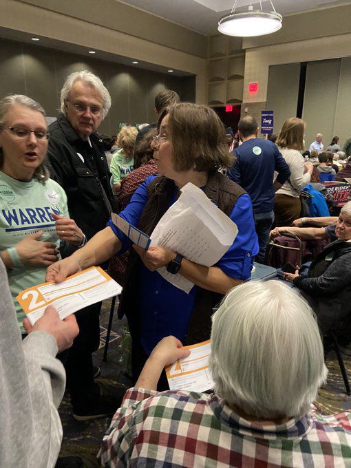 Presidential preference cards are handed out